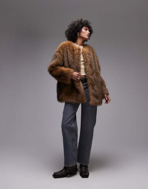 Topshop - Manteau mi-long en fausse fourrure style mongol à col cheminée - Blanc