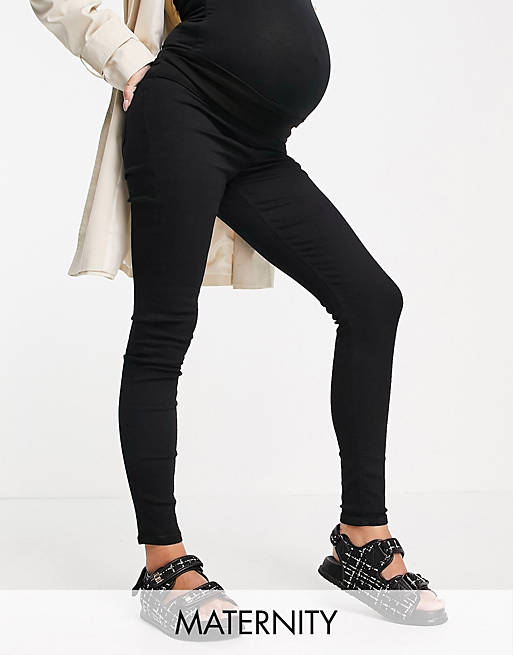 Topshop Maternity under bump Joni jeans in black | ASOS
