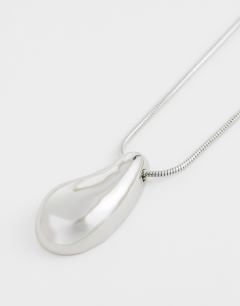 Model wearing Matilda teardrop pendant necklace in silver