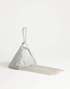 Model wearing Matty small diamante triangle grab bag with tassels in silver