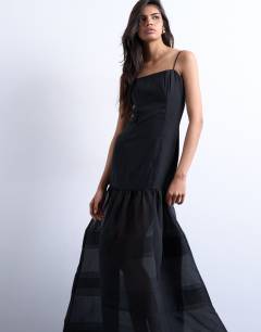 Model wearing Maxi dress with sheer layered volume skirt in black