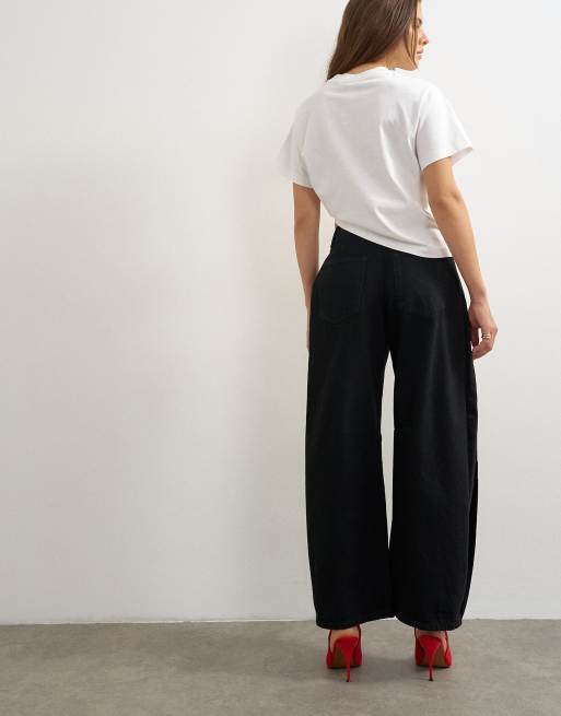 Topshop mellemhøj talje sideplisserede balloon-jeans i sort, 3 af 10