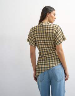 Model wearing Mesh check funnel tunic top in check print