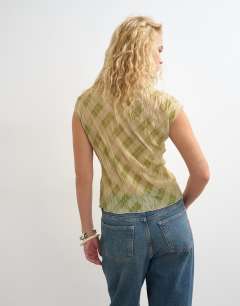 Model wearing Mesh crinkle fitted tee in check print