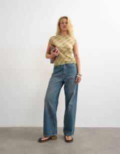 Model wearing Mesh crinkle fitted tee in check print