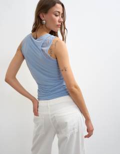 Model wearing Mesh double layer ruched top in dusty blue