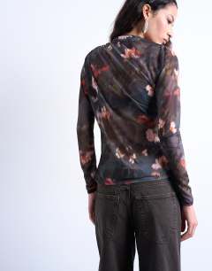 Model wearing Mesh floral print ruched long sleeve top in black