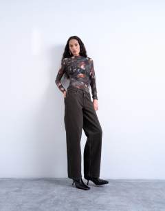 Model wearing Mesh floral print ruched long sleeve top in black