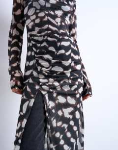 Model wearing Mesh maxi animal print long sleeve dress in multi