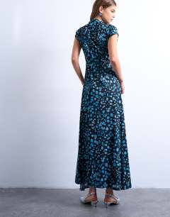 Model wearing Mesh polka dot cap sleeve ruched maxi dress in blue