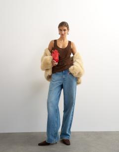Model wearing Mesh ruched tunic layered vest in brown