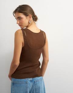 Model wearing Mesh ruched tunic layered vest in brown