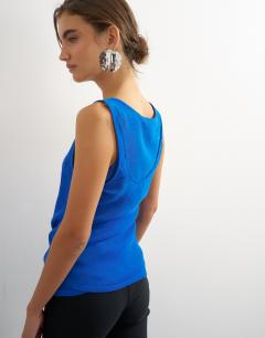 Model wearing Mesh ruched tunic layered vest in cobalt blue