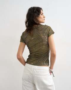 Model wearing Mesh ruched wrap short sleeve top in green