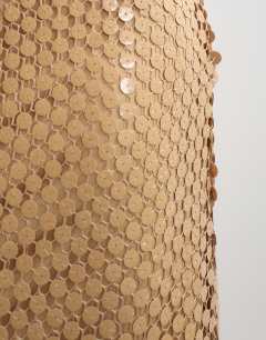 Model wearing Mesh sequin column maxi skirt in tan