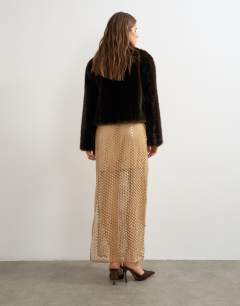 Model wearing Mesh sequin column maxi skirt in tan