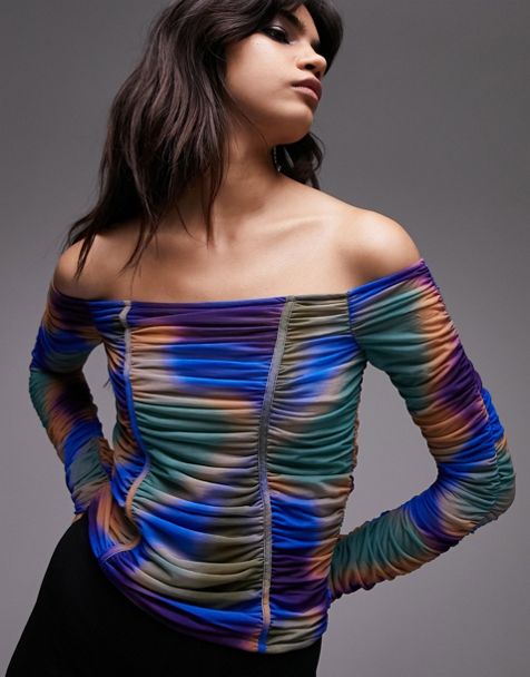 Topshop mesh off the shoulder top with ruching effect and "corset" style seams at the front. It has long sleeves and a multi colored ombre print. Its fitted to the body with flattering ruching. 
