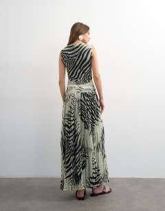 Model wearing Mesh zebra print drop waist maxi dress in mono
