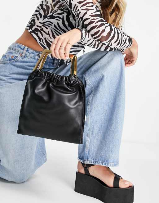 metal handle grab clutch bag in black ASOS