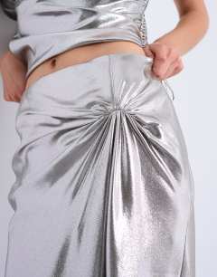 Model wearing Metallic knot lame midi skirt in silver