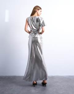 Model wearing Metallic knot lame midi skirt in silver
