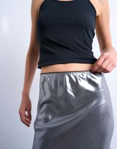 Model wearing Metallic lace hem midi skirt in silver