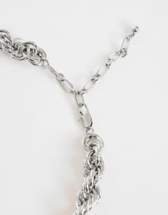 Model wearing Mia twist necklace in silver