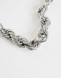 Model wearing Mia twist necklace in silver