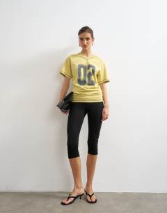 Micro v-neck ruched side graphic tee in yellow