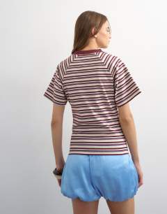 Model wearing Micro v-neck ruched side tee in stripe