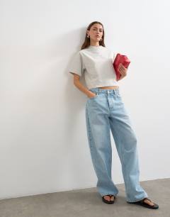 Model wearing Micro v-neck tee in grey marl