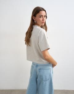 Model wearing Micro v-neck tee in grey marl