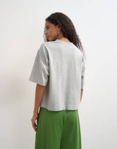 Model wearing Micro v short sleeve t-shirt in grey marl