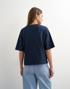 Model wearing Micro v short sleeve t-shirt in navy
