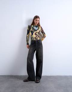 Model wearing Microfibre abstract print top in multi