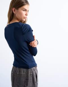 Model wearing Microfibre draped long sleeve top in navy