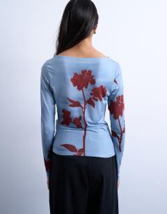 Model wearing Microfibre floral print long sleeve top in blue