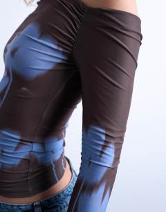 Model wearing Microfibre floral print ruched long sleeve top in brown