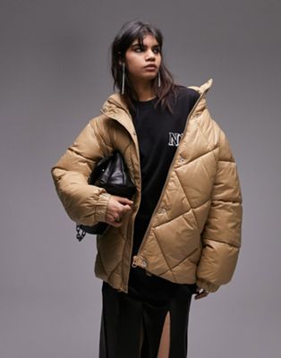 Topshop mid length wet look puffer with zip off sleeves in caramel