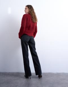 Model wearing Mid rise bootcut jean in washed black