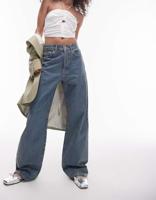 Topshop mid rise loose fit coated jeans in dirty marble wash