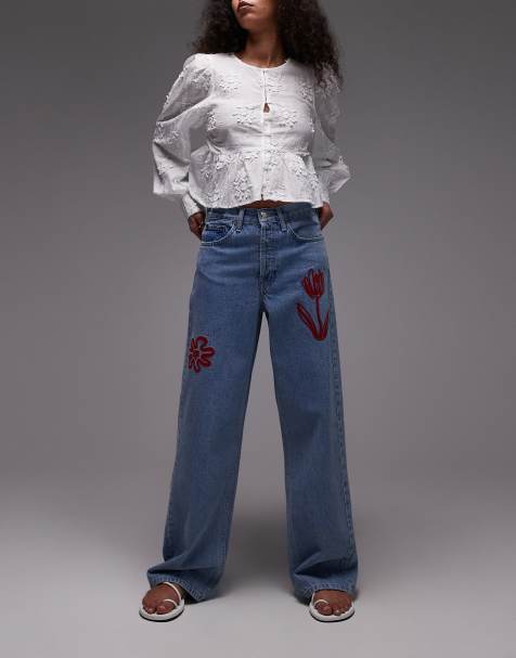 Topshop mid rise loose fit jeans with red floral embroidery in mid blue - view 1