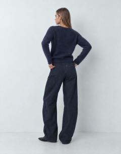 Model wearing Mid rise overlap barrel jean in sulphur blue