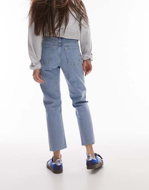 トップショップ Topshop mid rise straight jeans with raw hem in