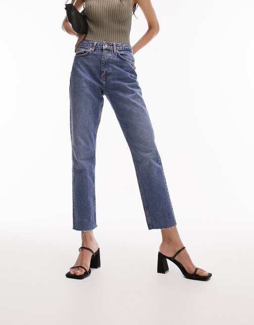 Topshop mid rise straight jeans with raw hem in mid blue