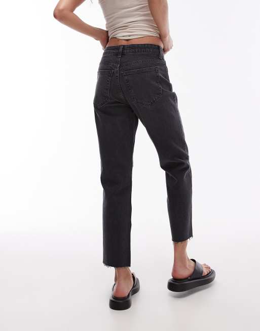 Topshop Petite straight jeans with raw hem in washed black