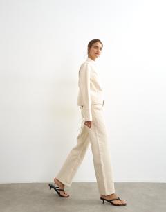 Model wearing Mid rise straight leg jean with lace up detail in oat