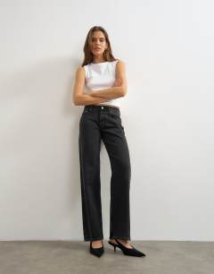 Model wearing Mid rise straight leg jean with lace up detail in washed black