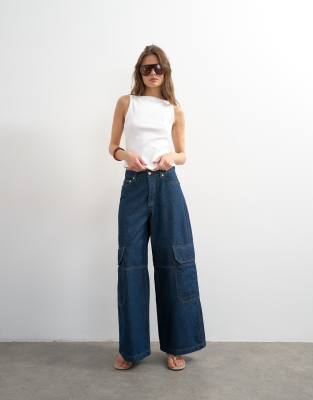 Topshop mid rise wide leg jeans with utility pocket detail in indigo rinse
