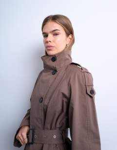 Model wearing Mid trench coat in brown